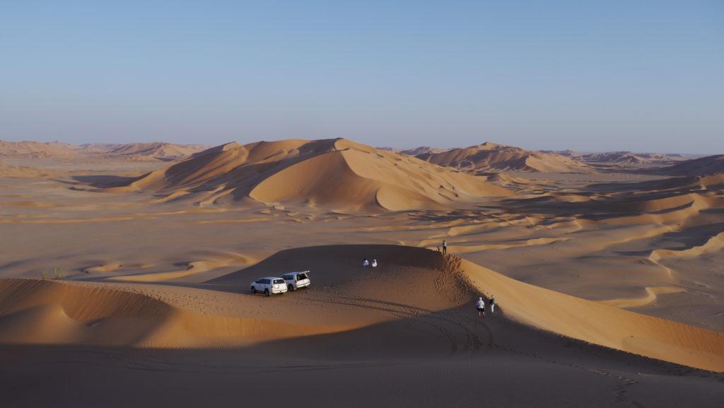 Tour to the Empty Quarter desert from Salalah, watching the sunset from the top of the dune.
