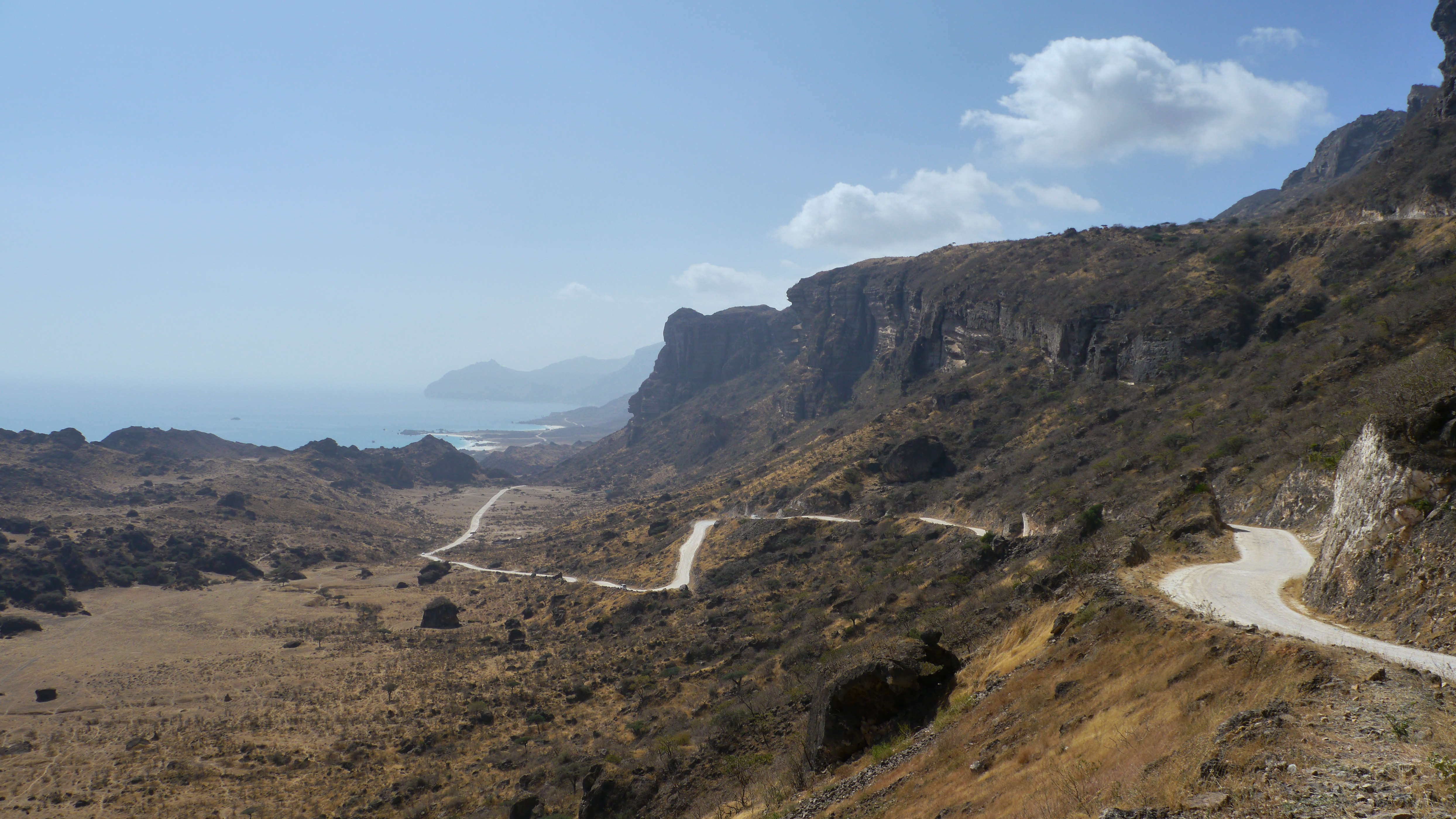 Fazaya beach is found under the stunning steep slopes of Jebel Qamar mountain range, western coast of Dhofar, Trip from Salalah.