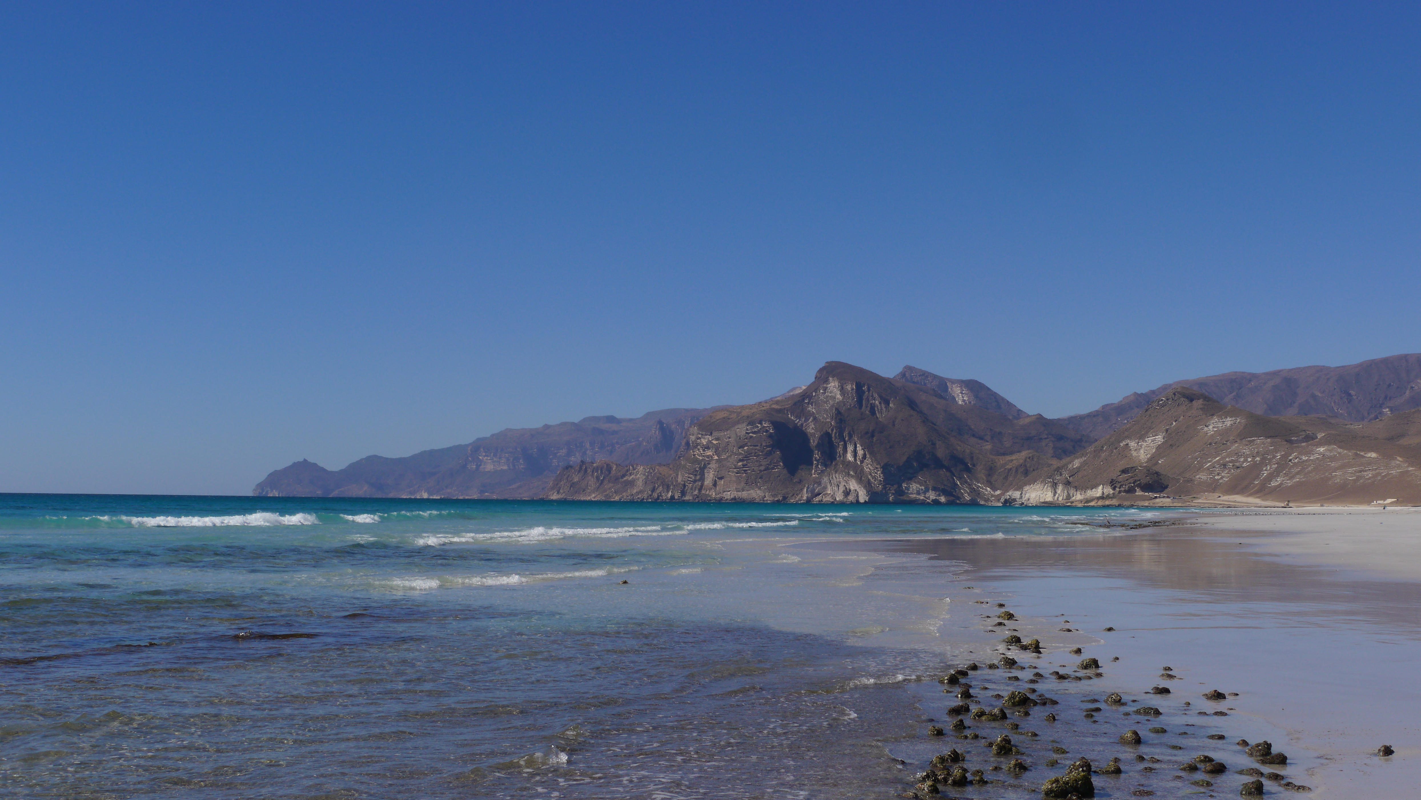 The beautiful sandy beach in Mughsail, west of Salalah, is an excellent swimming spot. Marneef cave and blowholes are found on the end of the beach.