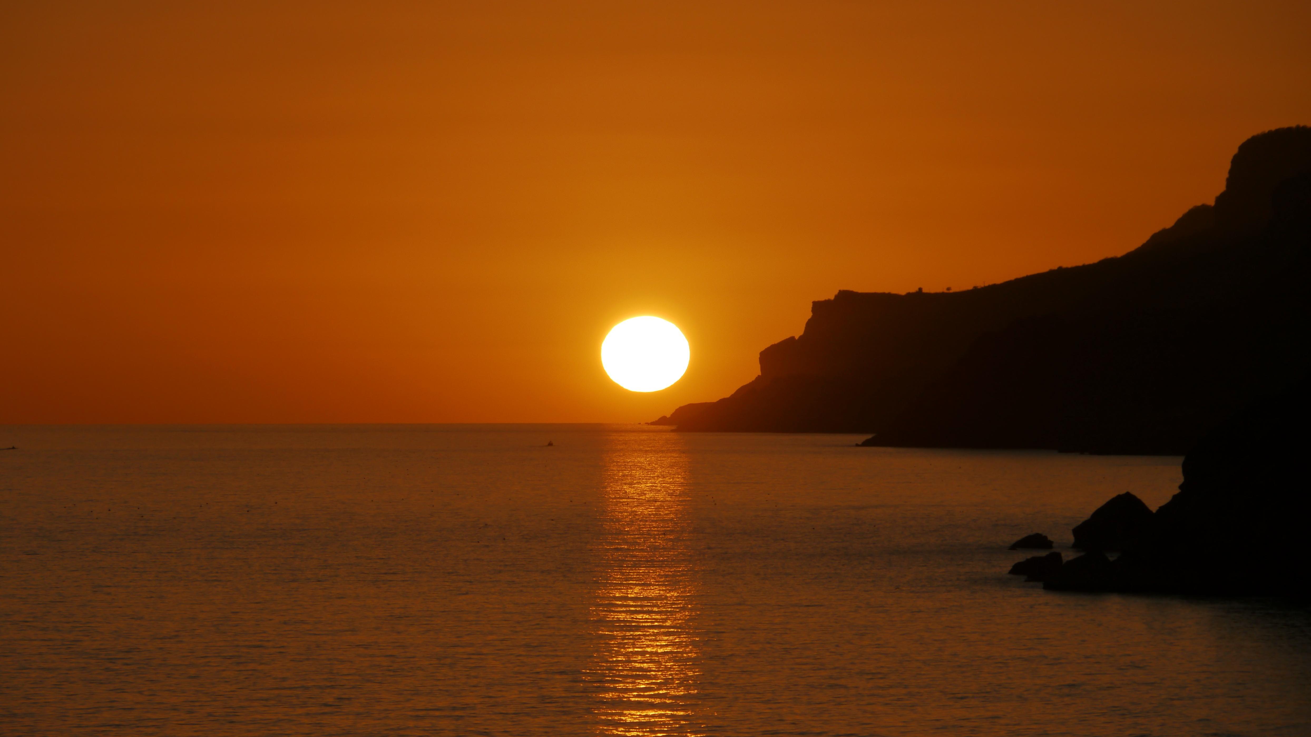 Sunset viewed from Dhalkut beach. Excursion from Salalah to Dhalkut. Dfofar West Coast Odyssey.