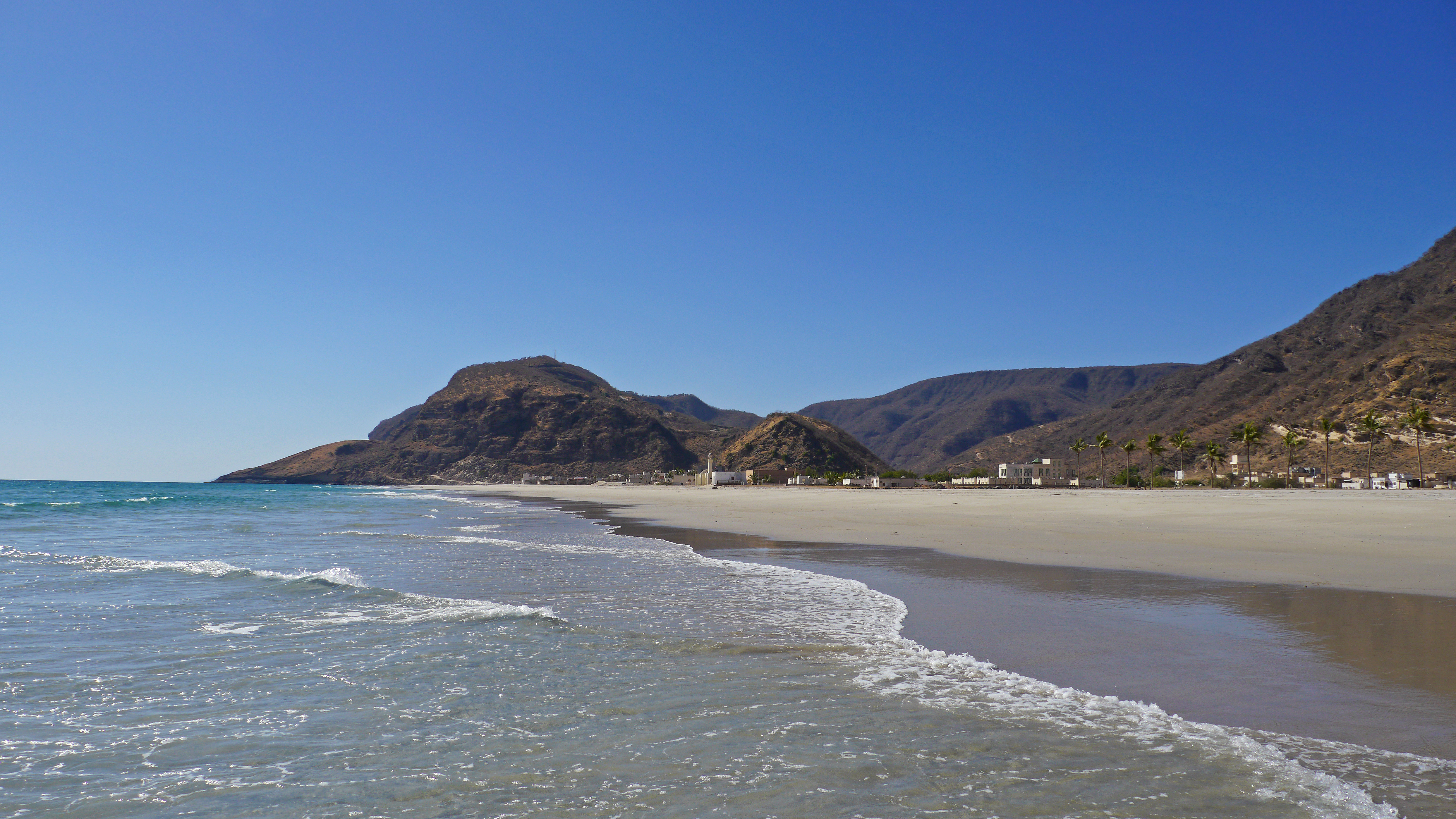 Beach in Rakhyut village in Western Dhofar. Ideal place to swim alone. Dhofar West Coast Odyssey from Salalah to Dhalkut.